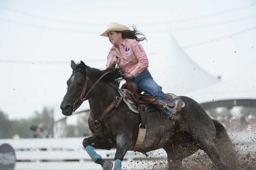 Reigning Cheyenne Frontier Days barrel racing champion Nellie Miller is defending back-to-back titles this week at Frontier Park. Riding her blue roan mare Rafter W Minnie (Sister), she won Quarter Finals 6 with a time of 17.37 seconds