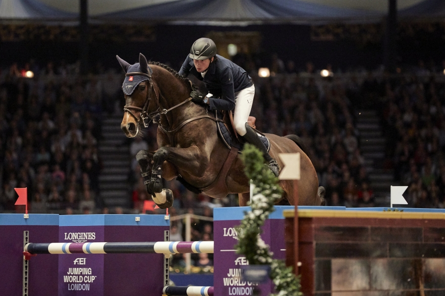 Martin Fuchs (SUI) riding The Sinner at The Longines FEI Jumping World Cup at Olympia, London (GBR). Martin Fuchs finished in first place.
